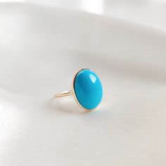 This stunning ring is set in 14k Solid Yellow Gold with Natural Arizona Turquoise with utmost precision. It is an unique dainty gemstone ring for nearly every occasion and is completely hassle-free jewelry. 🔷ABOUT GEMSTONE: Turquoise is a vibrant and highly valued gemstone that has been used for its beauty and perceived metaphysical properties. Turquoise is believed to provide protection against negative energies and harmful influences. It is thought to act as a shield, helping to ward off psyc December Birthstone Ring, Handmade Jewelry Box, Ring Turquoise, Arizona Turquoise, Bezel Ring, Sleeping Beauty Turquoise, December Birthstone, 14k Gold Ring, Yellow Gold Ring