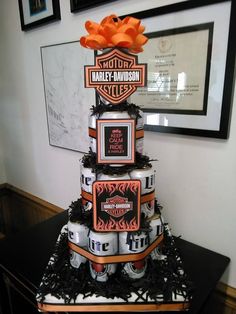 a cake made to look like harley davidson beer cans stacked on top of each other