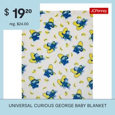 a blue and yellow baby blanket with an image of a cartoon character on the back