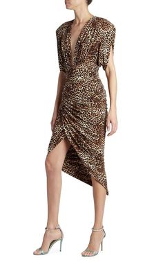 Cut in an asymmetric silhouette, Alexandre Vauthier's leopard-print midi-dress is elevated by structured shoulder pads and a plunging V-neck.Brown leopard printStretch-designRuched detailingV-neckShoulder padsShort sleevesConcealed rear fasteningHigh-low hemComposition: Viscose 95%, Spandex/Elastane 5%Dry Clean Elegant Leopard Print V-neck Midi Dress, Chic Leopard Print V-neck Midi Dress, Fitted Leopard Print V-neck Midi Dress, Leopard Print Ruched Dress For Night Out, Chic V-neck Leopard Print Midi Dress, Ruched Leopard Print Dress For Party, Ruched Leopard Print Party Dress, Leopard Print Ruched Dress For Party, Elegant V-neck Leopard Print Midi Dress