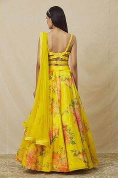 Yellow can can attached lehenga with multicolour floral print. Comes with padded mirrorwork blouse, belt and dupatta.
Components: 4
Pattern: Embroidered,Printed
Type Of Work: Mirrorwork,Floral
Neckline: Sweetheart
Sleeve Type: Sleeveless
Fabric: Organza
Color: Yellow
Other Details: 
Cut-out back
Closure:
Blouse: Back hook
Lehenga: Side closure
Length: 44 Inches
Occasion: Sangeet,Cocktail - Aza Fashions Print Lehenga, Sweetheart Neck, Floral Bouquets, Set For Women, Aza Fashion, Sleeve Type, Lehenga, Types Of Sleeves, Cut Out