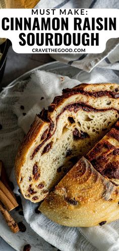 cinnamon raisin sourdough on a plate with cinnamon sticks