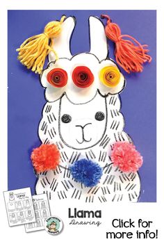 a llama with red, white and blue pom poms