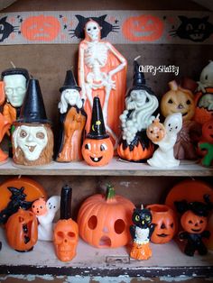 a shelf filled with lots of halloween decorations