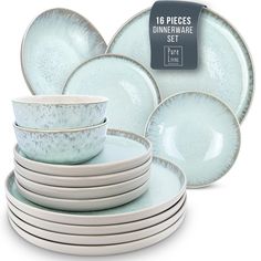 the dinnerware set is light blue with speckles