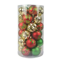 a clear container filled with red and green christmas bauble ornament ornaments