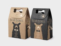 two boxes with bearbones on them are shown side by side, one is black and the other is brown