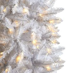 a white christmas tree with lights on it