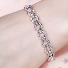 Express your creative side with the simple elegance of our chain bracelet. Crafted in sterling silver, the stylish piece gives your look a playful edge that lets you tell your story in your own unique way. Discover the complete selection of our classic chain bracelet for women.Carat Weight: 4.068 ctStone Size: 1.5,1.1,0.9 mmNumber of Stones: 344 Stone Shape: RoundStone Color: Diamond WhiteWeight: 13.52 gWidth: 8.5 mmHeight: 4.8 mmThickness: 7 mmMaterial: Stone Type: Jeulia® StonePlating Color: S Elegant Silver Chain Paperclip Bracelet As Gift, Elegant Sterling Silver Paperclip Bracelet With Adjustable Chain, Silver Chain Bracelet With Adjustable Chain, Sterling Silver Round Bracelet With Chain For Everyday, Silver Sterling Paperclip Bracelet With Adjustable Chain, Elegant Link Chain Bracelet In White Gold, White Gold Oval Link Bracelet As A Gift, Elegant Silver Chain Link Paperclip Bracelet, Elegant Sterling Silver Paperclip Bracelet