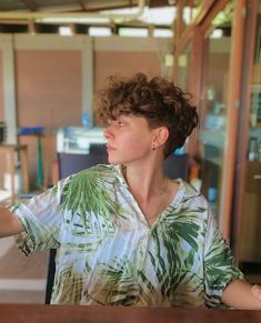 Curly Short Hair Undercut, How To Grow Out A Curly Pixie Haircut, Women’s Tapered Haircut, Curly Short Undercut, Curly Pixie Fade, Curly Mullhawk, Short Haircuts With Undercut, Nonbinary Curly Hair, Short Curly Hair Shaved Side