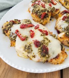 Pesto Chicken Parmesan - Delicious crispy parmesan chicken with pesto sauce, melty mozzarella cheese and sun-dried tomatoes. Pesto Chicken, Chicken Parmesan, Parmesan, Pesto, Sauce, Cheese, Chicken, White