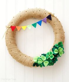 a burlock wreath decorated with shamrock leaves