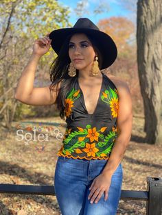 This Beautiful Sunflower Embroidered Halter Top is the perfect Top for Everyday use or a special event. It is comfortable, with elastic on the back and has a tie around the neck for an adjustable fit. This blouse comes in one size which fits sizes Small and Medium. Fitted Floral Embroidered Top For Festival, Fitted Multicolor Embroidered Top For Festival, Fitted Top With Multicolor Floral Embroidery, Fitted Multicolor Floral Embroidered Top, Spring Traditional Embroidered Fitted Top, Fitted Traditional Embroidered Top For Spring, Fitted Multicolor Embroidered Blouse For Beach, Fitted Floral Embroidered Top For Summer, Fitted Floral Print Embroidered Top For Summer