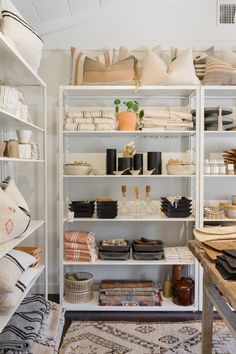 the shelves are filled with many different items