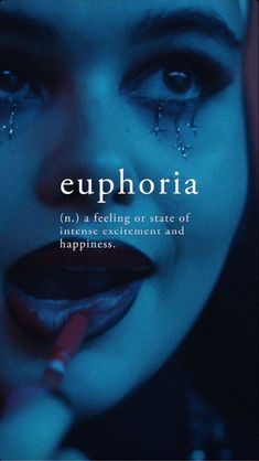 the cover of euphora, with an image of a woman's face painted blue