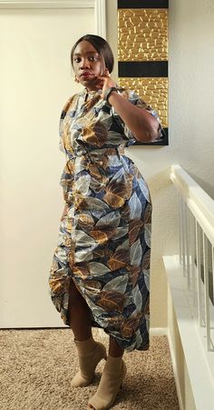 This Ruched African Print Dress is designed to give you a curvy feminine touch. The matching fabric belt can be adjusted to fit your desired waist size and comfort. The print fabric is light and  soft on the skin. You can certain of your comfort all day long.  The color pattern on the fabric is calm an unique, it gives class, style and elegance. Whether you want to look sophisticated or simple but elegant, you can't go wrong in this African Print Dress.  Dress it up with a pair of high heels, sneakers or flat heels as needed. Designed as a high neck with wide short sleeves and a fabric belt to cinch the waist and adjust waist to desirable size.  Note ✨️There might be a slight color variation depending on the resolution of your device. Suitable for any occasion, Casual, Travel, Daily Life, High Heels Sneakers, Ankara Gown, Gown For Women, Flat Heels, Heels Sneakers, Belt Women, African Print Dress, Fabric Belt, Ruched Dress