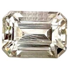 an emerald cut diamond on a white background