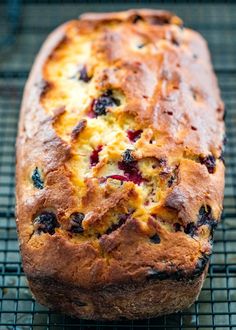 a loaf of bread sitting on top of a cooling rack