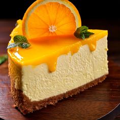 a slice of cheesecake with an orange on top