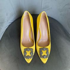 Yellow Satin Almond Toe Pumps Featuring A Crystal Buckle. Perfect For A Date Night Or For Festive Season And Weddings. Size: Us 8 Heel: 3.5“ New Condition, Never Worn. Elegant Embellished Shoes For Wedding Guests, Elegant Embellished Wedding Shoes For Guests, Elegant Embellished Wedding Guest Shoes, Yellow Embellished Evening Heels, Embellished Heels For Wedding Guest, Yellow Embellished High Heels, Embellished Shoe Clips For Prom, Silver Fitted Heels For Wedding, Elegant Gold Shoe Clips For Party