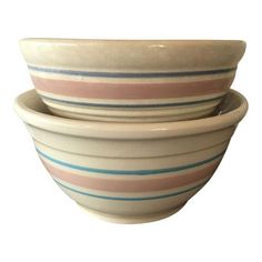 three striped bowls stacked on top of each other