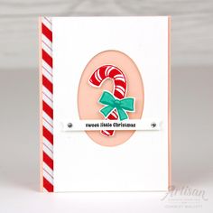 a close up of a christmas card with candy canes on the front and bottom