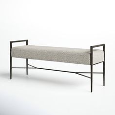 a bench made out of metal and fabric