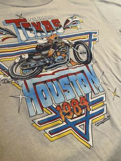 an image of a t - shirt with the words houston on it and a motorcycle