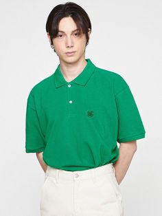 Editor's NotesThis is GRAVER's classic polo shirt embroidered with clover motif at the chest and it goes well with any bottoms. It's cut from cotton and poly-blend pique with soft touch.- Polo collar- Half placket with button fastenings- Graphic embroidery on the chest- Drop shoulder- Short sleeves- Relaxed fit- Unisex wear- Minimize distortion after washingMeasurements (in.)S / M / L- Total Length: 28.0 in. / 29.5 in. / 31.1 in.- Shoulder: 19.3 in. / 20.5 in. / 21.3 in.- Chest: 20.9 in. / 22.0 in. / 22.8 in.- Sleeve Length: 8.3 in. / 8.7 in. / 9.1 in.Model Info:- Man: 5' 10.1, 143.3 lbs / Fitting size L- Woman: 5' 5, 112.4 lbs / Fitting size SComposition & Care- 80% Cotton, 20% Polyester (20's)- Recommend separate wash at low temperature water using neutral detergent or dry cleanDesig Classic Green Top With Embroidered Logo, Green Collared Cotton Polo Shirt, Green Cotton Collared Polo Shirt, Green Relaxed Fit Polo Shirt, Green Cotton Polo Shirt With Collared Neckline, Classic Green Polo Shirt With Relaxed Fit, Smile Embroidery, Graphic Embroidery, Polo Shirt White