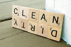 scrabble tiles spelling the word clean and bid