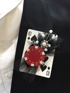 a black suit with a red and white playing card on it