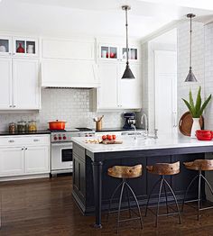 an advertisement for a kitchen with white cabinets and black counter tops, featuring the words'win $ 25, 000 to refresh your kitchen for spring '