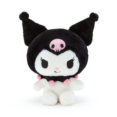 a black and white stuffed animal with pink eyes