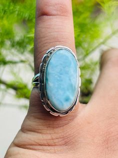 Handmade Product Description Gemstone :  Larimar Stone Size :  23 x 12  MM ( Approx. ) Stone Shape : Oval Secondary Stone : None Faceted/cab : CAB Ring Size : All Size Available Band Color : Silver Made In (INDIA) Payment Policy We accept payment through PayPal Payment should be made within 3 days of purchase. Delivery Time It is Handmade Item So Item will be Shipped within 3 to 5 Days after payment receive. The delivery time usually takes 11 to 24 days, depending which Country & location. We recommend you contact your local customs office if you have questions about this. Feedback If you are not satisfied with your purchased items then contact with us first before leaving negative or neutral feedback or opening disputes. We believe in solving the issues. A positive feedback represents our Handmade Oval Larimar Turquoise Ring, Turquoise Larimar Ring In Silver, Luxury Blue Larimar Ring, Oval Larimar Cabochon Rings, Oval Blue Larimar Jewelry, Larimar Stone, Bohemian Rings, Statement Ring Silver, Love Ring