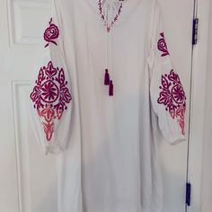 Chic Collection Size Large. New With Tags In White With Red Tassels. Cotton And Rayon Dress With Lining Underneath. Red Bohemian Dress With Tassels, Red Tassel Dress For Spring, Red V-neck Dress With Tassels, White Long Sleeve Dress, Rayon Dress, White Long Sleeve, Tunic Dress, Dress Collection, Sleeve Dress