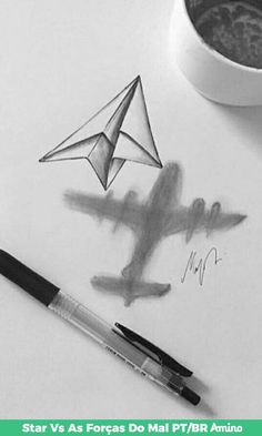 a drawing of a paper airplane next to a cup of coffee