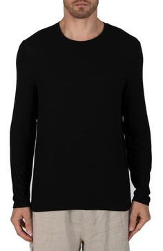 A classic for a reason, this ribbed long-sleeve T-shirt can easily be layered with all of your favorite looks. Crewneck Long sleeves 95% modal, 5% spandex Hand wash, dry flat Made in Peru Black Long Sleeve Fine Knit Top, Black Fine Knit Long Sleeve Tops, Long Sleeve T-shirt With Ribbed Neckline, Long Sleeve Ribbed Sweatshirt For Layering, Long Sleeve T-shirt With Ribbed Neckline And Stretch, Long Sleeve T-shirt With Ribbed Neckline And Relaxed Fit, Stretch Long Sleeve T-shirt With Ribbed Neckline, Basic Long Sleeve T-shirt For Layering, Long Sleeve T-shirt With Ribbed Neckline For Fall