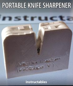 an image of two sharpener blades with the words portable knife sharper on it