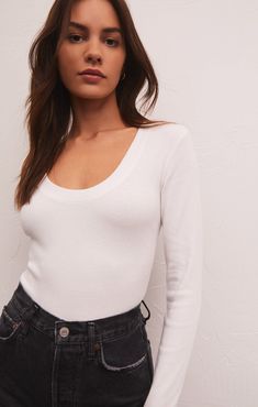 It's all sleek lines and elevated feels with the Sirena Rib Long Sleeve Tee. This perfect fitted layering piece can be worn with anything, tucked or untucked. Fitted Premium Feather Rib: 95% Cotton, 5% Spandex Scoop neck Long sleeve Midweight Heavy soft wash Short Loungewear, Rib Fabric, Scoop Neck Long Sleeve, Boutique Design, Ladies Boutique, Ribbed Fabric, Layering Pieces, Long Sleeve Tee, Look Fashion