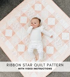 a baby laying on top of a pink blanket with the words ribbon star quilt pattern