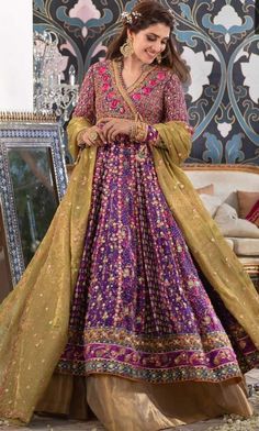 Pakistani & Indian bridal Anarkali heavy embroidered angarkha lehenga, Wedding lehenga detailing with gotta, thread, & sheesha work. Buy online in USA Gold Floor-length Choli With Dabka Detail, Gold Floor-length Dabka Choli, Anarkali Gown With Zari Work In Jamawar, Designer Traditional Wear With Intricate Embroidery In Purple, Traditional Purple Wear With Intricate Embroidery, Gold Anarkali Choli In Jamawar, Purple Zari Work Floor-length Salwar Kameez, Designer Purple Gown With Intricate Embroidery, Purple Floor-length Salwar Kameez With Zari Work