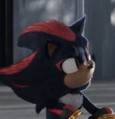 a cartoon character with red hair and black eyes is riding a skateboard in sonic the hedgehog movie