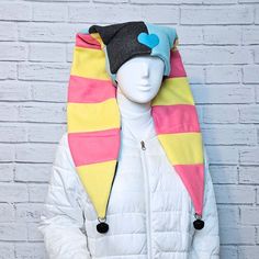 "Orders ship within 2-3 weeks. Striped jester hat styled like Fizzarolli.   Colors are bright pink, yellow, green, teal, and charcoal gray.   Black bells on the ends. Made to order from polyester fleece, so it's warm and soft. Machine washable (remove the bells first). Small fits head sizes 18\" to 20\". Medium fits head sizes 21\" to 24\". Large fits head sizes 25\" to 26\"." Fizzarolli Hat Pattern, Themed Fitted Hat For Cosplay, Fun Multicolor Costume Hats And Headpieces, Playful Costume Hat And Headpieces, Adjustable Harajuku Costume Hats For Cosplay, Pink Brimmed Costume Hat For Winter, Pink Brimmed Winter Costume Hat, Pink Winter Costume Hats And Headpieces, Pink Winter Costume Hat