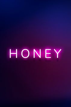 the word honey is lit up in pink and blue colors on a purple background with an orange light