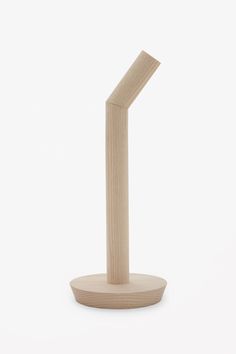 a wooden object on a white background