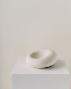 a white object sitting on top of a box