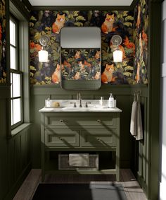 a bathroom with green walls and floral wallpaper on the walls, along with two sinks