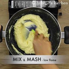 a person mixing food in a pan on top of an electric stove with the words mix & mash - low flame