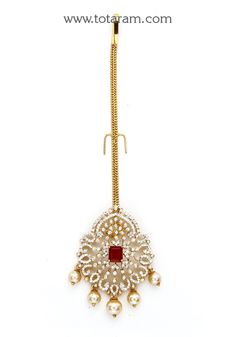 18 karat gold "detachable" diamond maang tikka cum pendant - papidi billa with color stones & south sea pearls
  this product can be used as pendant.
  this product has inter changeable stones in the pendant. 
  gross weight of the pendant without chain : 13.000 grams
  gross weight of the chain without pendant : 1.850 grams
  length of the pendant : 2.10 inches
  width of the pendant :  1.25 inches
 - 235-GT474 - in 14.850 Grams for USD $2,938.22 USD. 
Made in India by Totaram Jewelers Online t Diamond Maang Tikka, Papidi Billa, Maang Tikka, Color Stones, South Sea Pearls, Sea Pearls, South Seas, Gifts For Adults, Stone Color