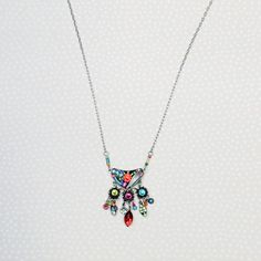 We might go as far to say that this necklace gives a garden full of blooming flowers a run for their money. The Firefly Botanical Bryn Necklace is simply bursting with color! You heard it here. We are still trying to catch our breath since we first laid eyes on this necklace and adds a dash of dazzle to your ensemble. We are certain that you will be reaching for the Firefly Botanical Bryn Necklace time and time again. Multi-color European crystals, Czech glass Chain approximately 18 inches long, Bohemian Multicolor Necklace With Flower Charm, Bohemian Multicolor Necklaces With Flower Charm, Whimsical Multicolor Pendant Necklace, Whimsical Multicolor Flower Necklace, Blooming Flowers, Firefly, Czech Glass, A Garden, Multi Color